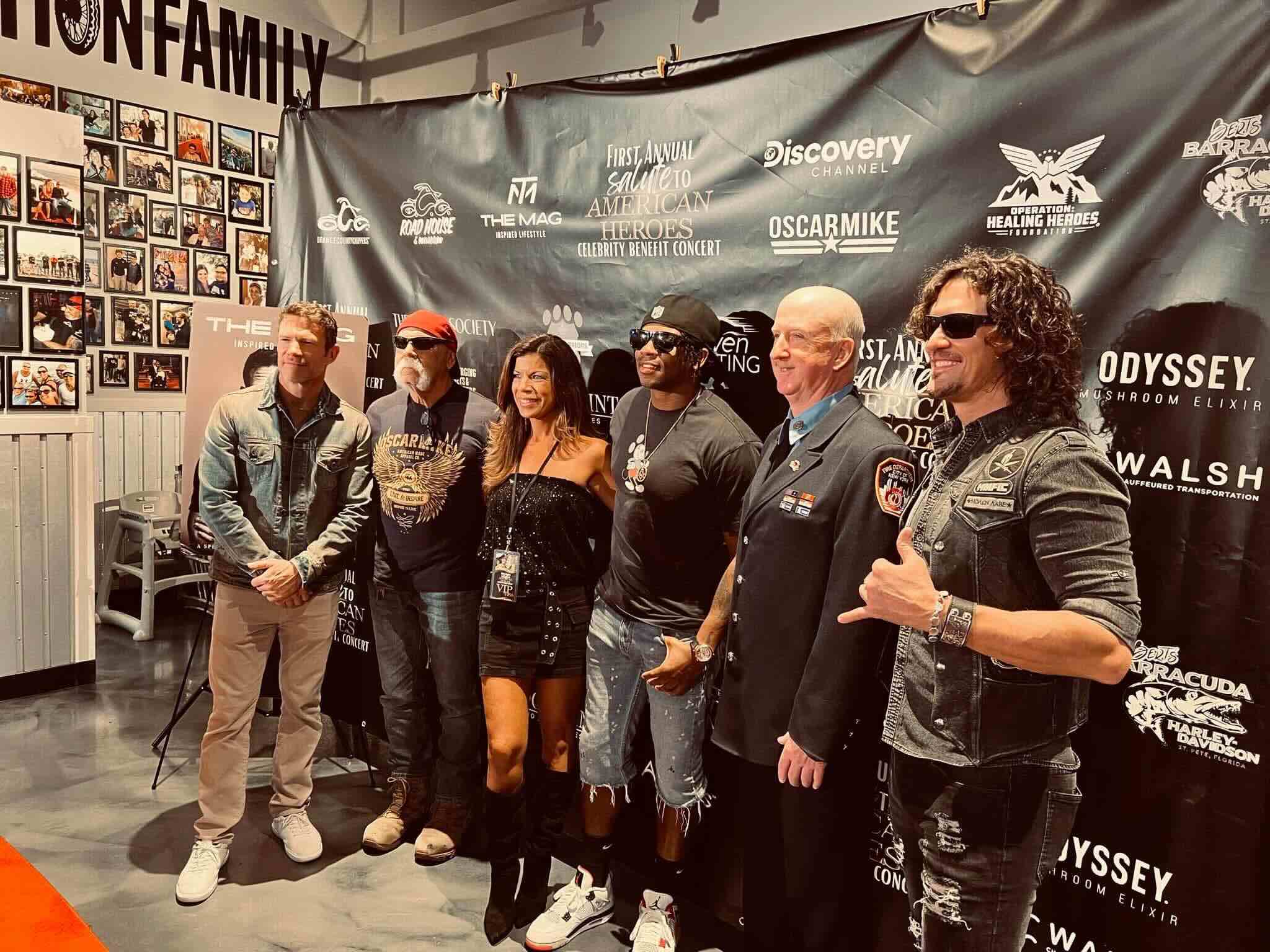 The Mag Lifestyle founder speaks at an event, sharing an inspiring journey of resilience and community impact.